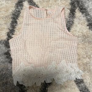 Pink sleeveless blouse